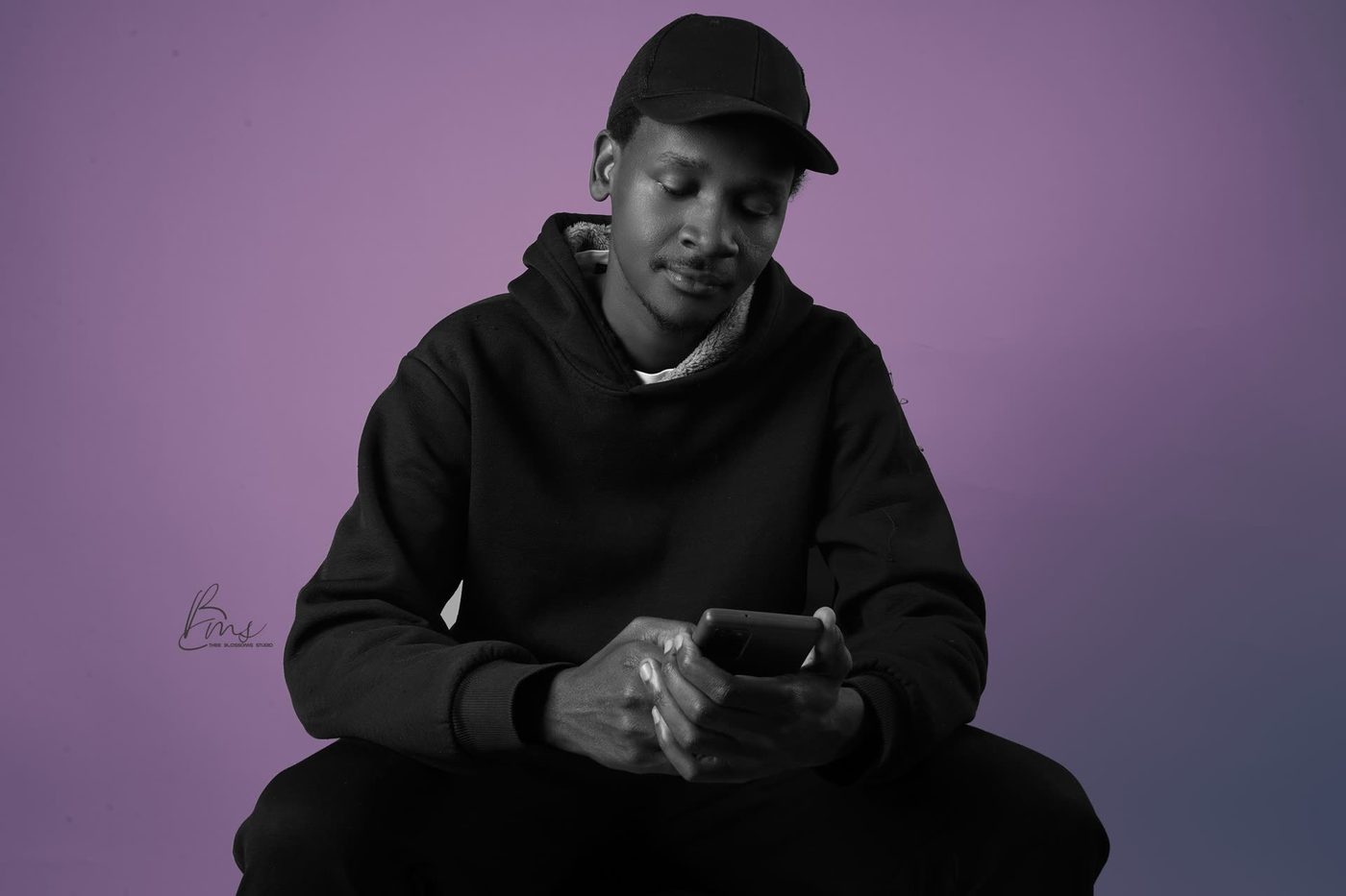 Studio portrait, purple backdrop